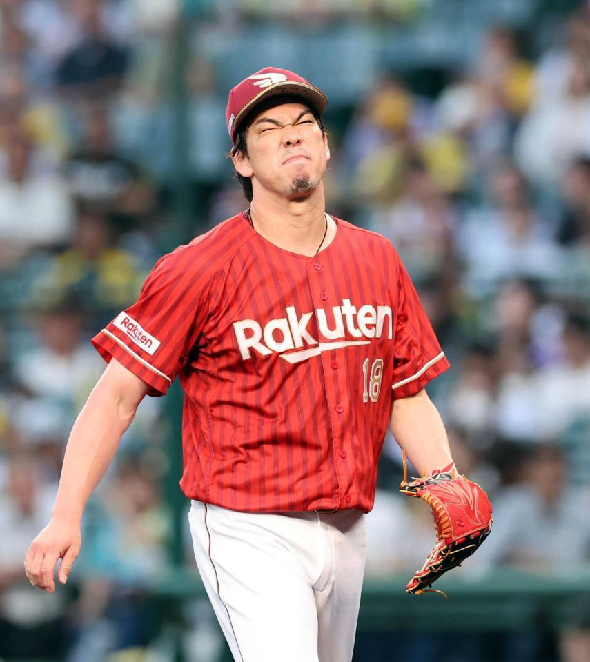 　先制を許した前田健は渋い表情を見せベンチに戻る（撮影・山口登）
