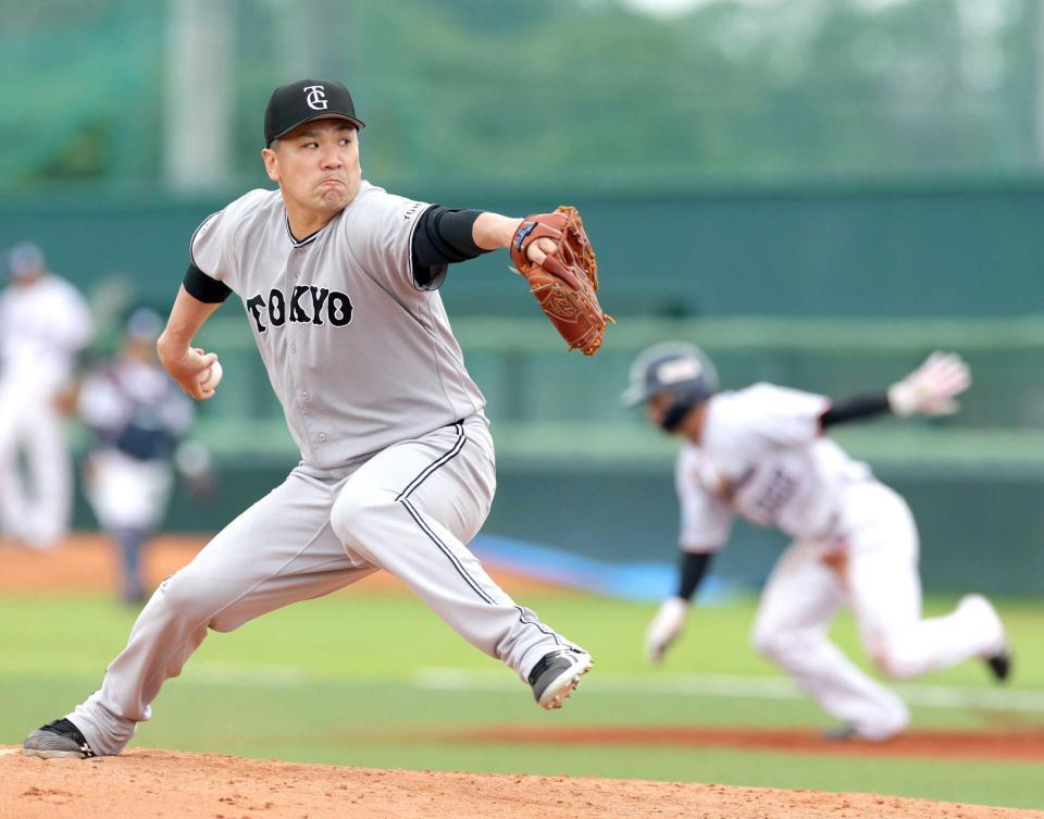 　５回、ランナーを背負いながらも粘投する田中将（撮影・西岡正）