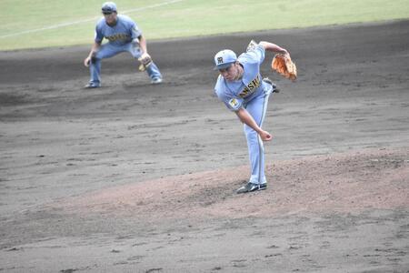 力投する石井