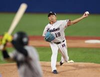力投する石川（撮影・金田祐二）