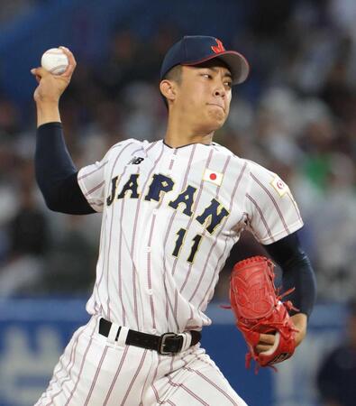 　雨の中で力投を見せる織田（撮影・佐々木彰尚）