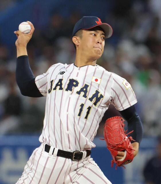 　雨の中で力投を見せる織田（撮影・佐々木彰尚）