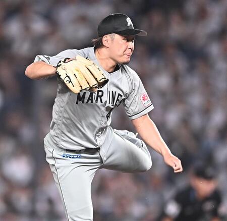 ８回から登板し１死ニングを無失点に抑えた鈴木（撮影・開出牧）