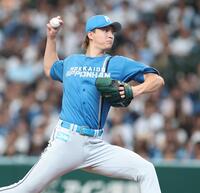 力投する達（撮影・金田祐二）
