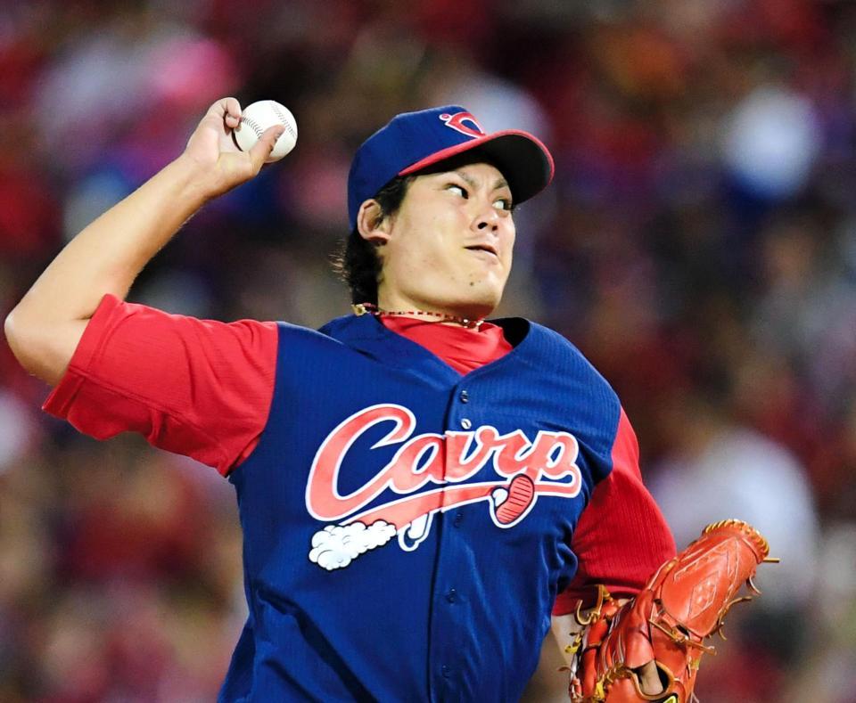 気迫の投球を見せる広島・九里＝マツダスタジアム（撮影・飯室逸平）