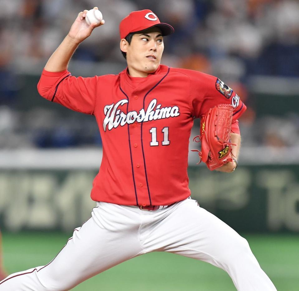 　巨人打線を相手に力投する九里（撮影・西岡正）