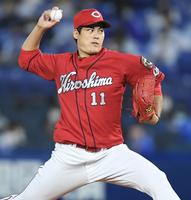 　力投する九里（撮影・金田祐二）