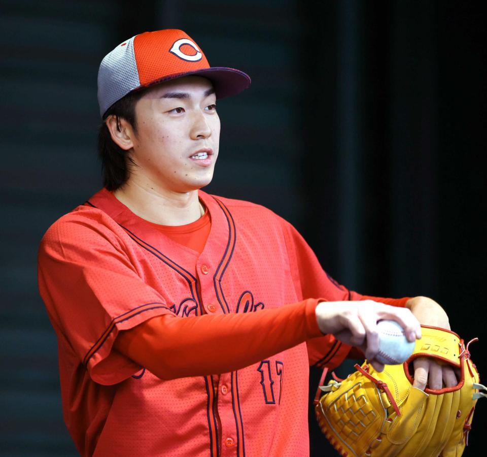 　ブルペンで投球練習する常広（撮影・山口登）