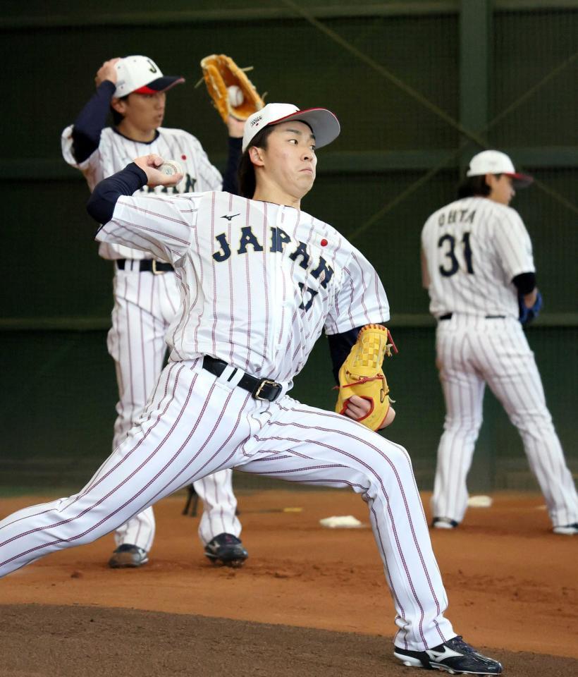 　ブルペンで投げ込む常広（撮影・立川洋一郎）