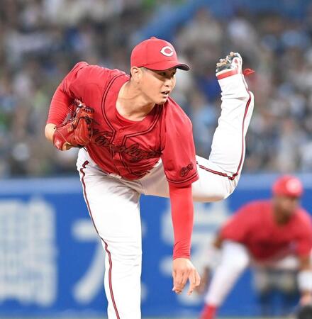 　力投する高橋（撮影・園田高夫）