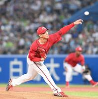 　力投する高橋（撮影・園田高夫）