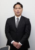 現役引退を表明する田中