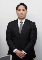 　現役引退を表明する田中