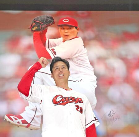 壁画の前で拳を握る栗林（撮影・北村雅宏）