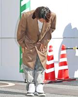 頭を下げる羽月隆太郎被告