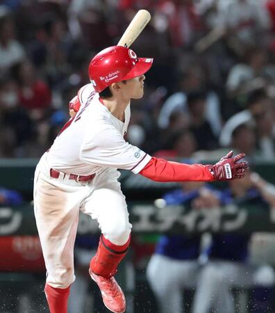 ７回、２点二塁打を放つ辰見