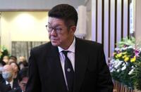 池谷公二郎さんの通夜に参列する佐々岡真司氏＝３０日