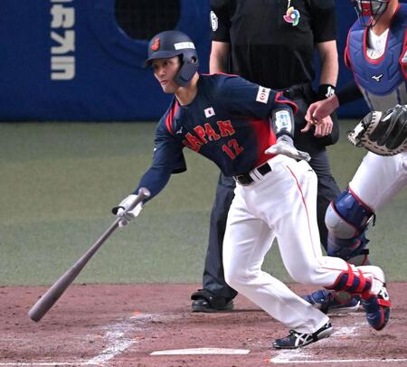 ５回、同点適時打を放つ坂本（撮影・飯室逸平）