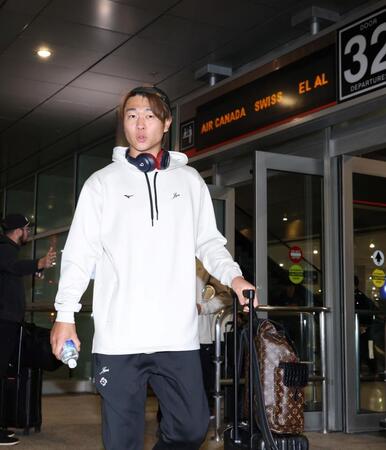 マイアミに到着した高橋（撮影・伊藤笙子）