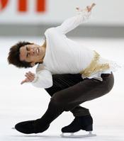 　男子フリーで優勝した織田信成の演技（共同）