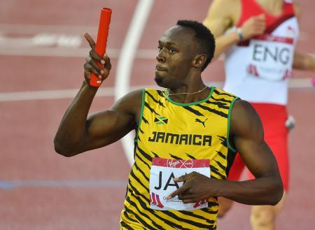 　英連邦大会の男子４００メートルリレー決勝にジャマイカのアンカーとして出場し、優勝に貢献したウサイン・ボルト＝グラスゴー（ゲッティ＝共同）