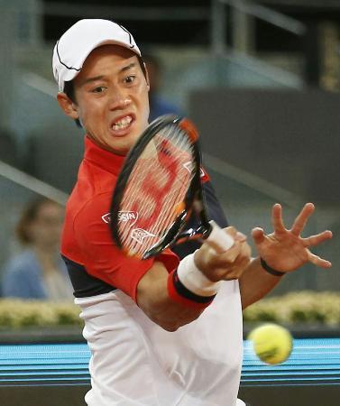 　男子シングルス準々決勝でダビド・フェレールにストレート勝ちした錦織圭＝マドリード（共同）