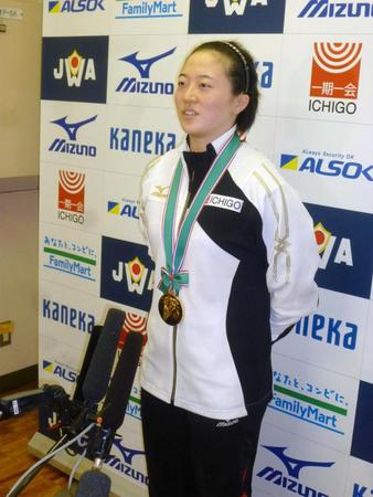 女子５８キロ級で３連覇した安藤美希子