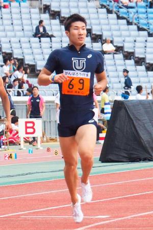 　男子２００メートル予選　20秒79でゴールする桐生祥秀（共同）