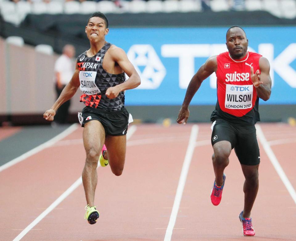 　男子２００メートル予選　１組で２０秒５２の２着となり準決勝に進んだサニブラウン・ハキーム（左）