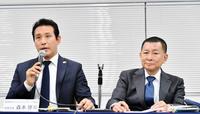 　記者の質問に答える森本専務理事（左）と柿沢理事長