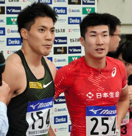 　優勝した山県亮太（左）と、２位の桐生祥秀（右）＝ヤンマースタジアム長居