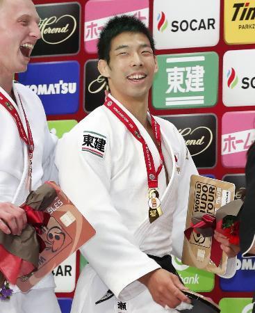 　男子８１キロ級で優勝し、笑顔の永瀬貴規＝丸善インテックアリーナ大阪