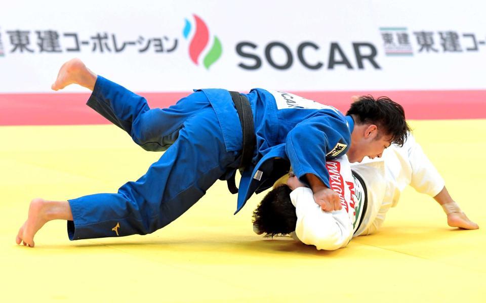 　丸山城志郎（下）から技ありを奪い優勝した阿部一二三（撮影・高部洋祐）