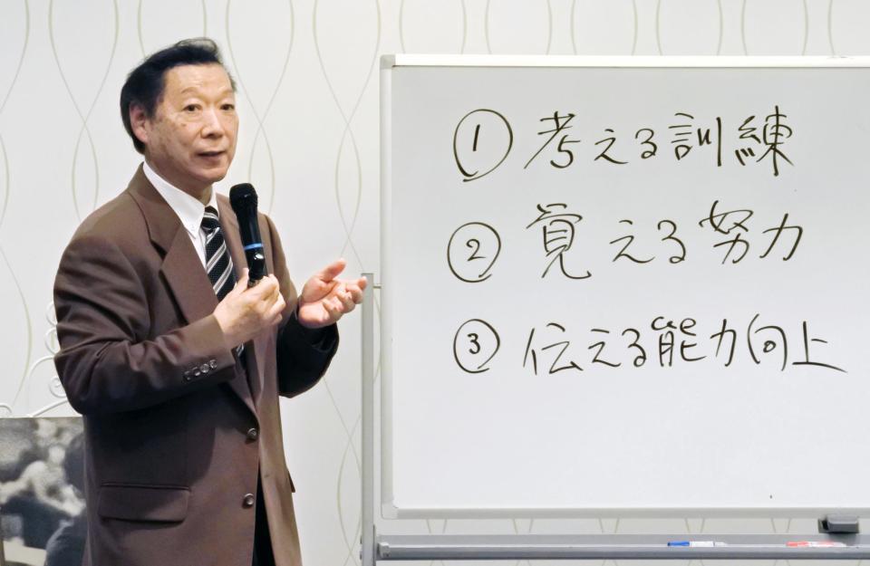 　講演する高島規郎氏
