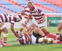 流通経大柏－大阪朝鮮高　前半、先制トライを決め、拳を握る大阪朝鮮高・金勇哲（中央）＝撮影・北村雅宏