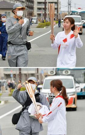 　走行中にトーチの炎が消え（上）、駆け寄ったスタッフによって再点火された＝２５日午後、福島県富岡町（代表撮影）