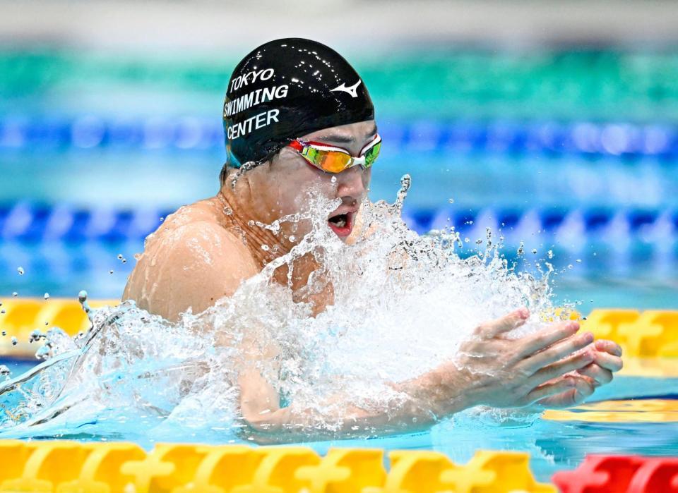 　男子１００メートル平泳ぎで優勝した佐藤翔馬