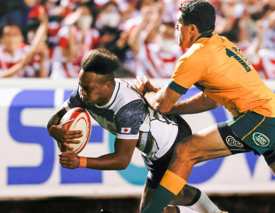 　トライを決める松島