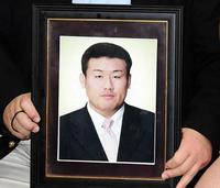 　故・浦山英樹さんの遺影