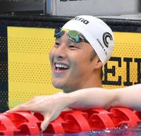 　男子２００メートルバタフライ予選を終えて笑顔を見せる瀬戸大也（撮影・堀内翔）