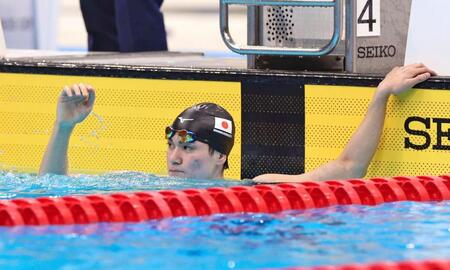 　男子４００メートル個人メドレーで優勝した松下知之