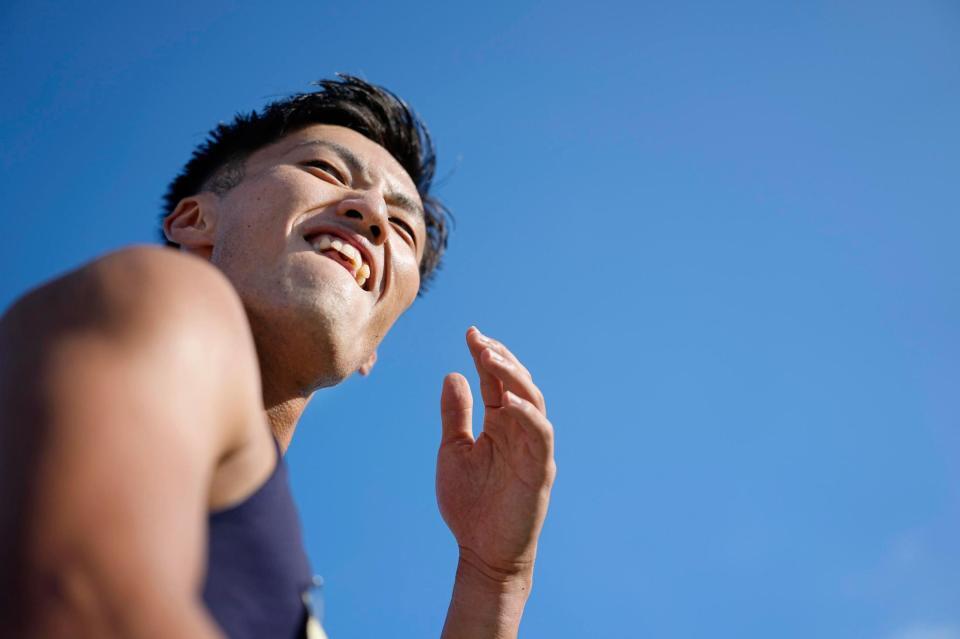 　男子１００メートル予選　９秒92でゴール後、追い風参考記録となり悔しそうな表情の柳田大輝