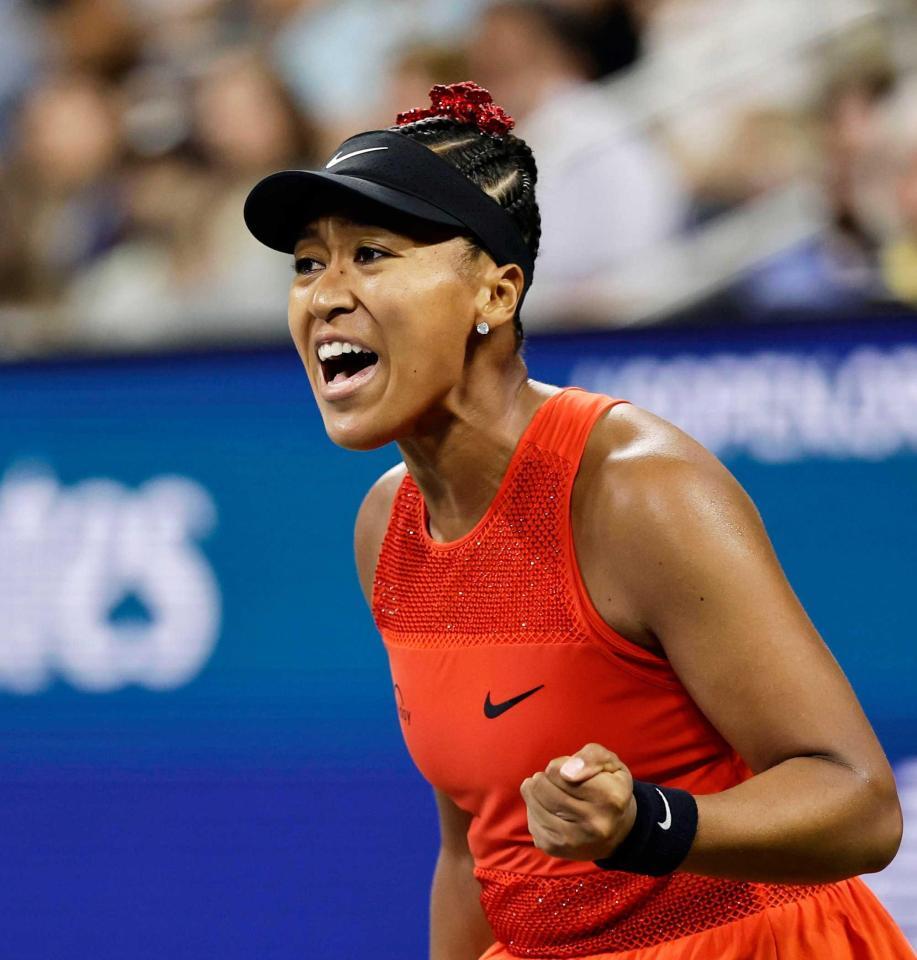 　ガッツポーズする大坂なおみ（共同）