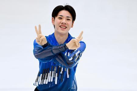 　ジュニア男子ＳＰの演技を終え、笑顔の田内誠悟＝邦和みなとスポーツ＆カルチャー