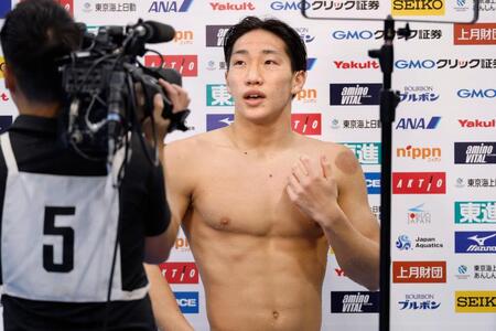 　男子１００メートル平泳ぎで優勝した大橋信