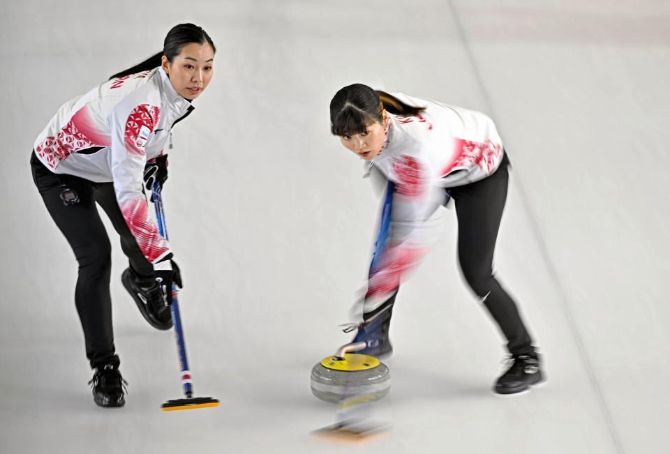 　トルコ戦の第２エンド、スイープする小谷。左は近江谷（共同）