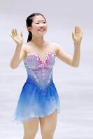 　女子フリーの演技を終え、笑顔を見せる中井亜美