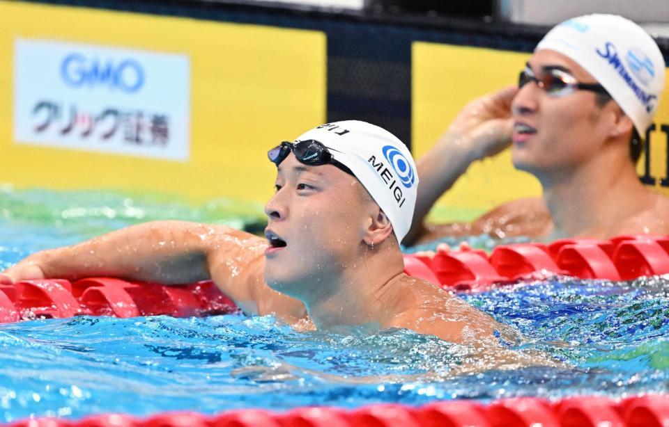 男子５０メートル平泳ぎ決勝のレースを終えた谷口卓。奥は岡留大和