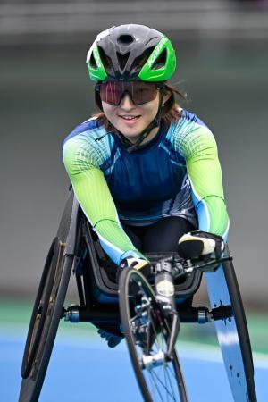 　女子１００メートル（脳性まひＴ３４＝車いす）　１８秒０６の日本新記録で優勝した吉田彩乃＝石川県西部緑地公園陸上競技場