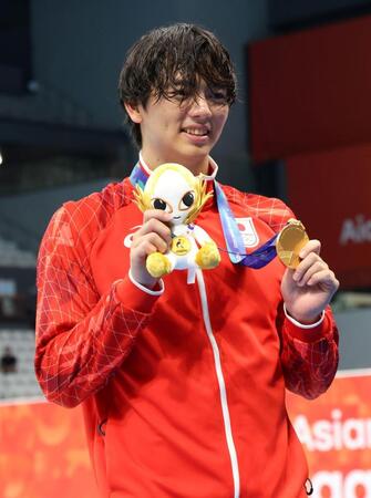 男子１００ｍバタフライで金メダルを獲得した光永翔音（撮影・伊藤笙子）